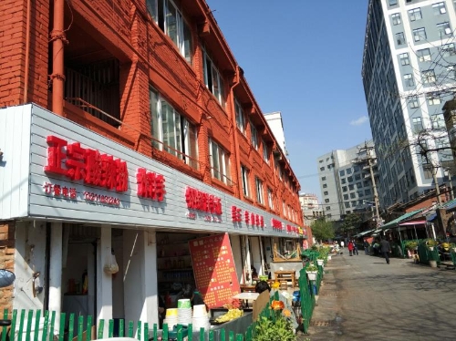 龙翔街道探索城市管理新模式  帮流动摊贩转岗再就业 中国科学网www.minimouse.com.cn