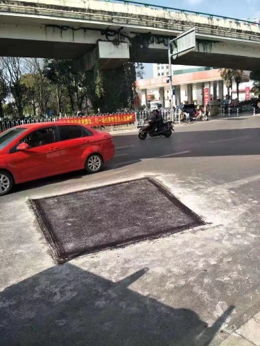 五华区道桥处开展一二一大街至小菜园立交桥下车行道路面维护工作 中国科学网www.minimouse.com.cn